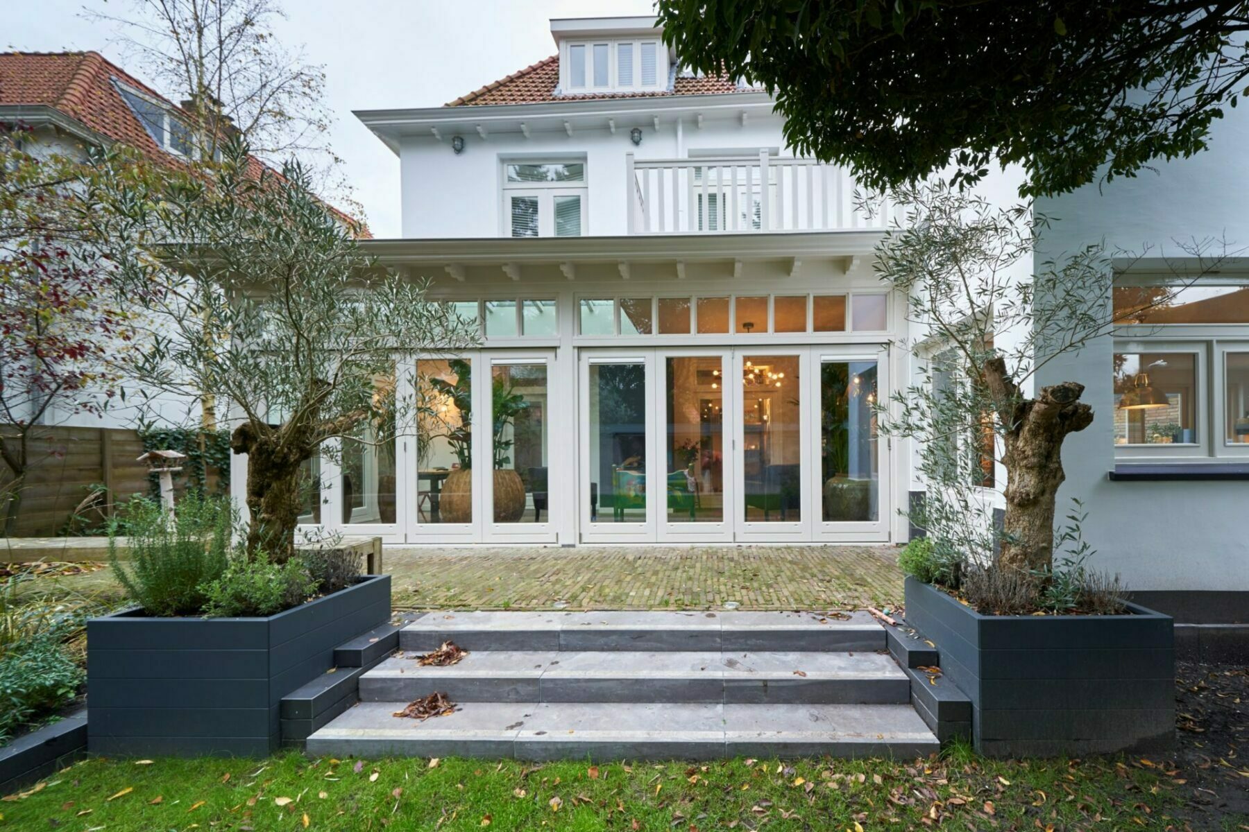 Klassieke serre met harmonicadeuren te Bloemendaal