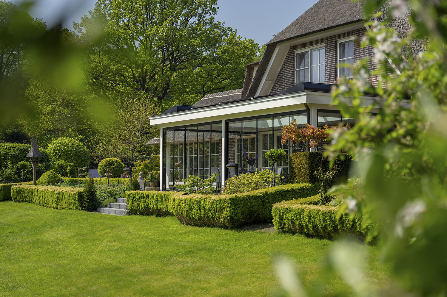 Veranda met glazen schuifwanden